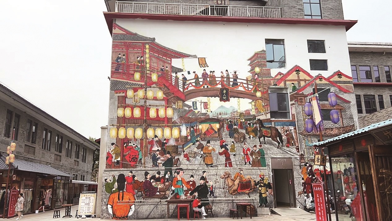 因为一个人爱上一座城，安徽画师扎根襄阳创作 贾蒙绘制街头壁画成网红打卡点