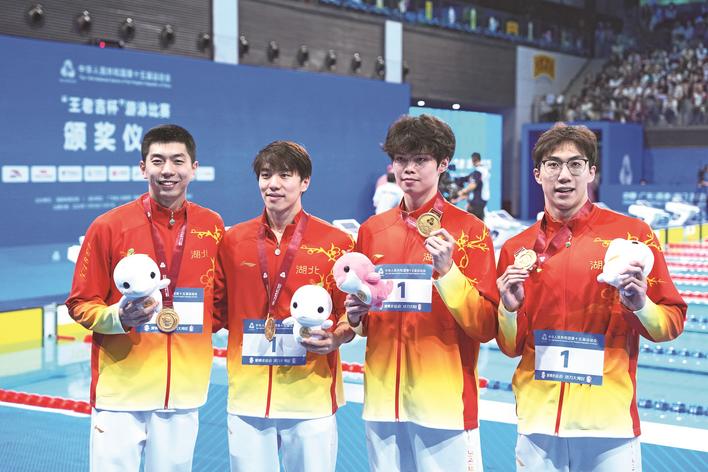 田径体操游泳捷报频传 荆楚军团一日揽得全运四金  男子百米飞人是湖北“眼镜侠”