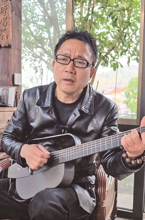 自己作词作曲并演唱的《早安隆回》播放量超1600亿次 袁树雄要为2026世界杯写新歌