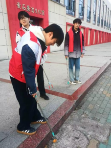 人工智能学院开展“清洁家园，美化环境”志愿服务活动