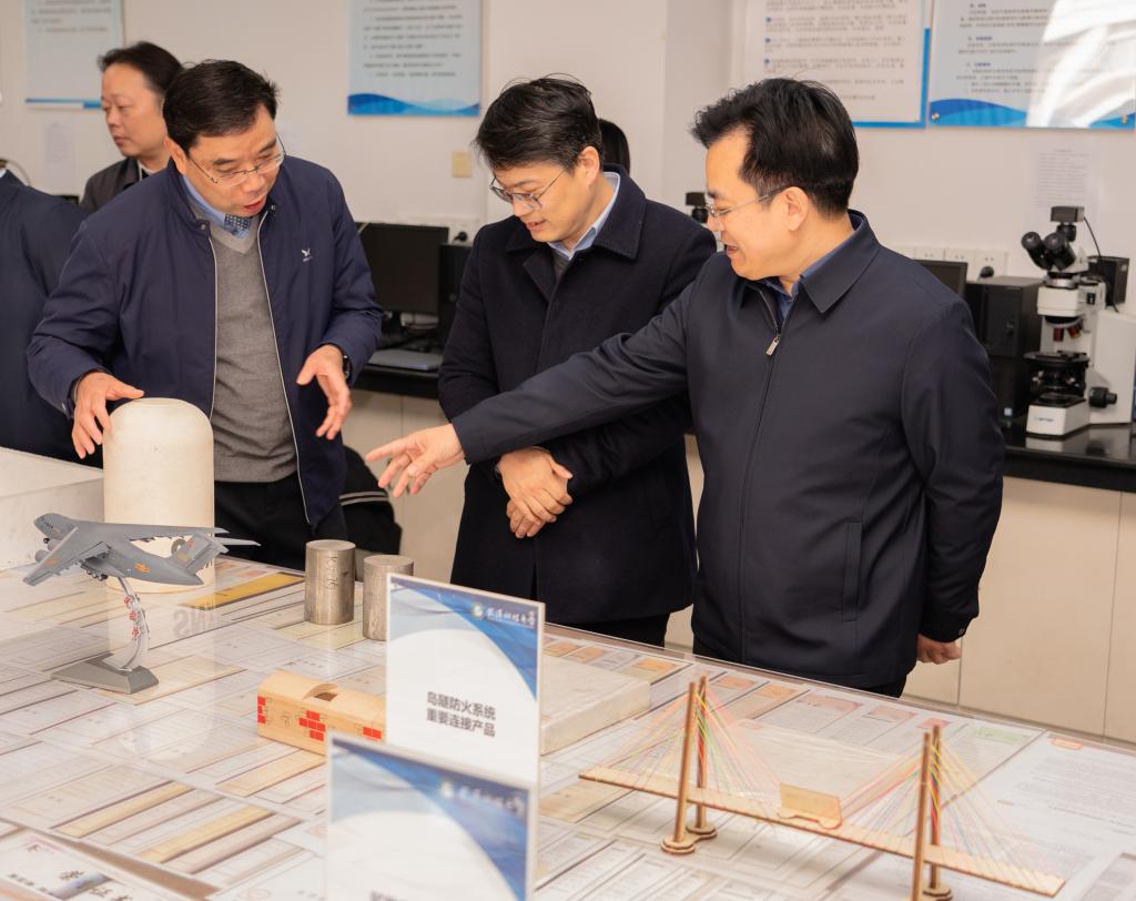 胡国珍一行赴武汉科技大学交流