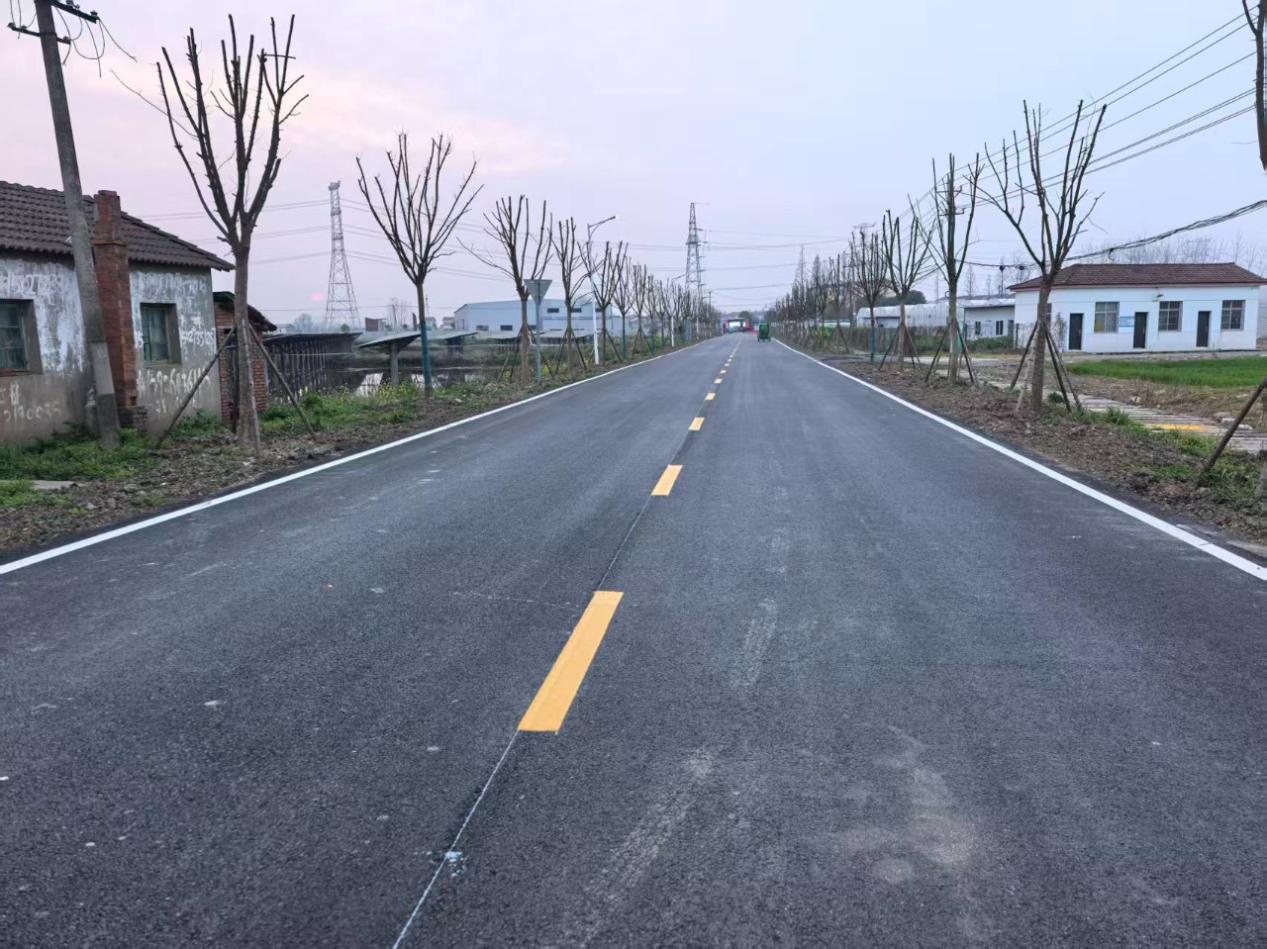 熊口管理区：路通心畅戏登台 民生实事暖心田